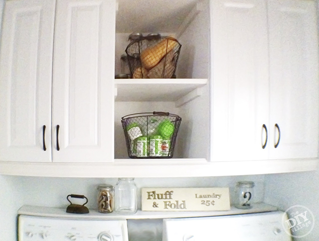 DIY Laundry Room makeover. I love these cabinets and the shelf between them. Gives functional and attractive.