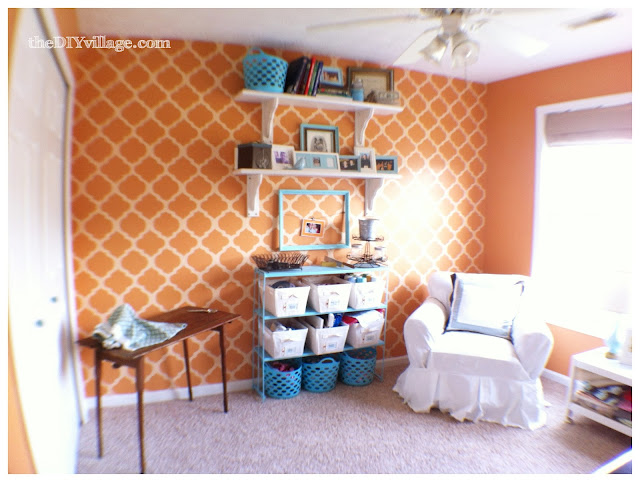 Orange and aqua craft room