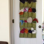 Over the Door Organizer for Winter Accessory Storage by: theDIYvillage.com