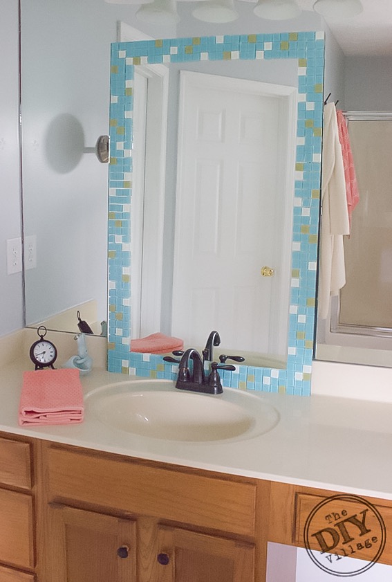 DIY no grout mosaic tile mirror. This is perfect for an apartment or dorm! 