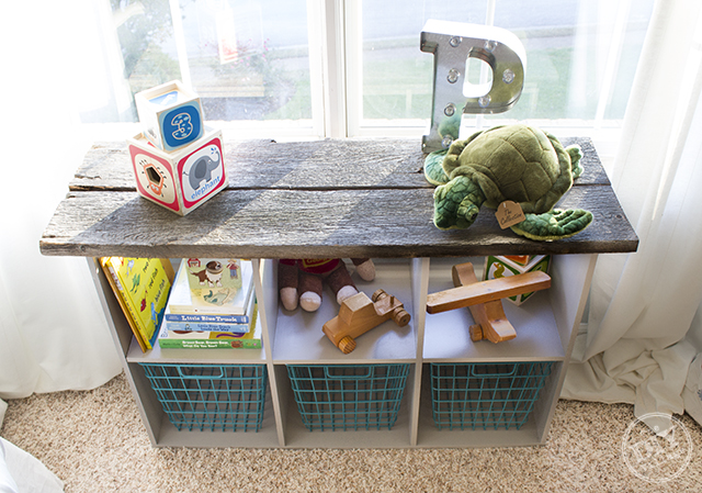 Laminate storage cube makeover with Reclaimed barnwood perfect for a rustic nursery or kids room!