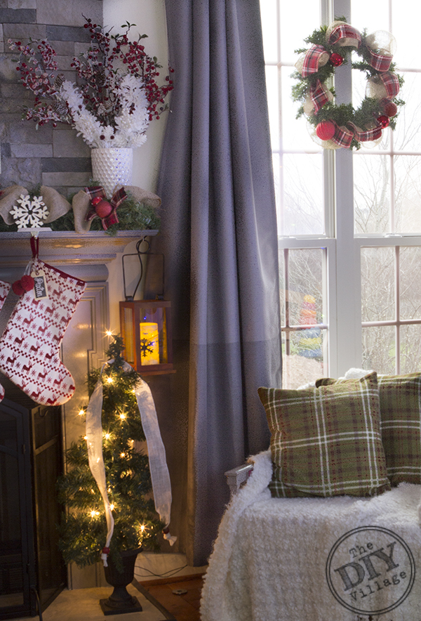 Awesome idea to hang wreaths on the inside of your windows to enjoy during the holidays!