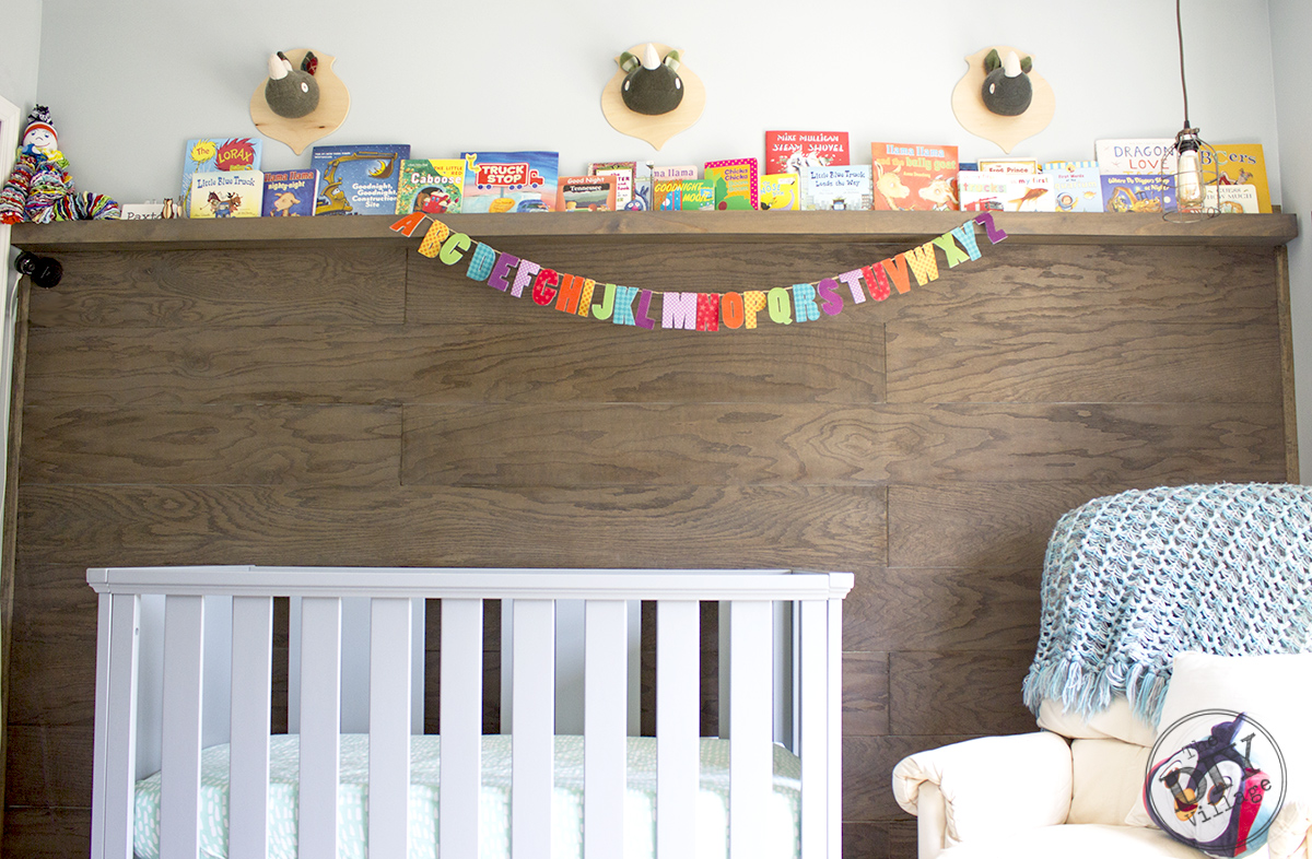 Modern Rustic baby nursery with bright pops of color