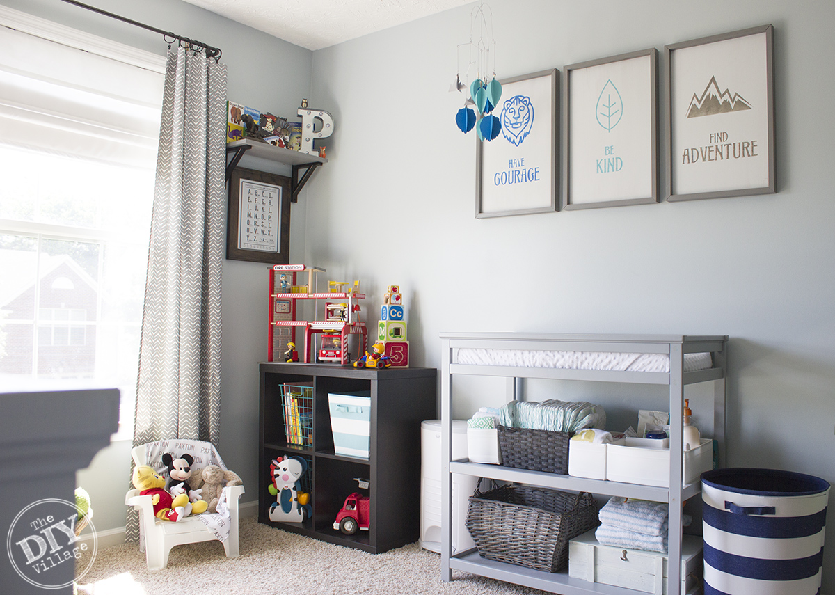 Modern Rustic baby nursery with bright pops of color and custom wall art