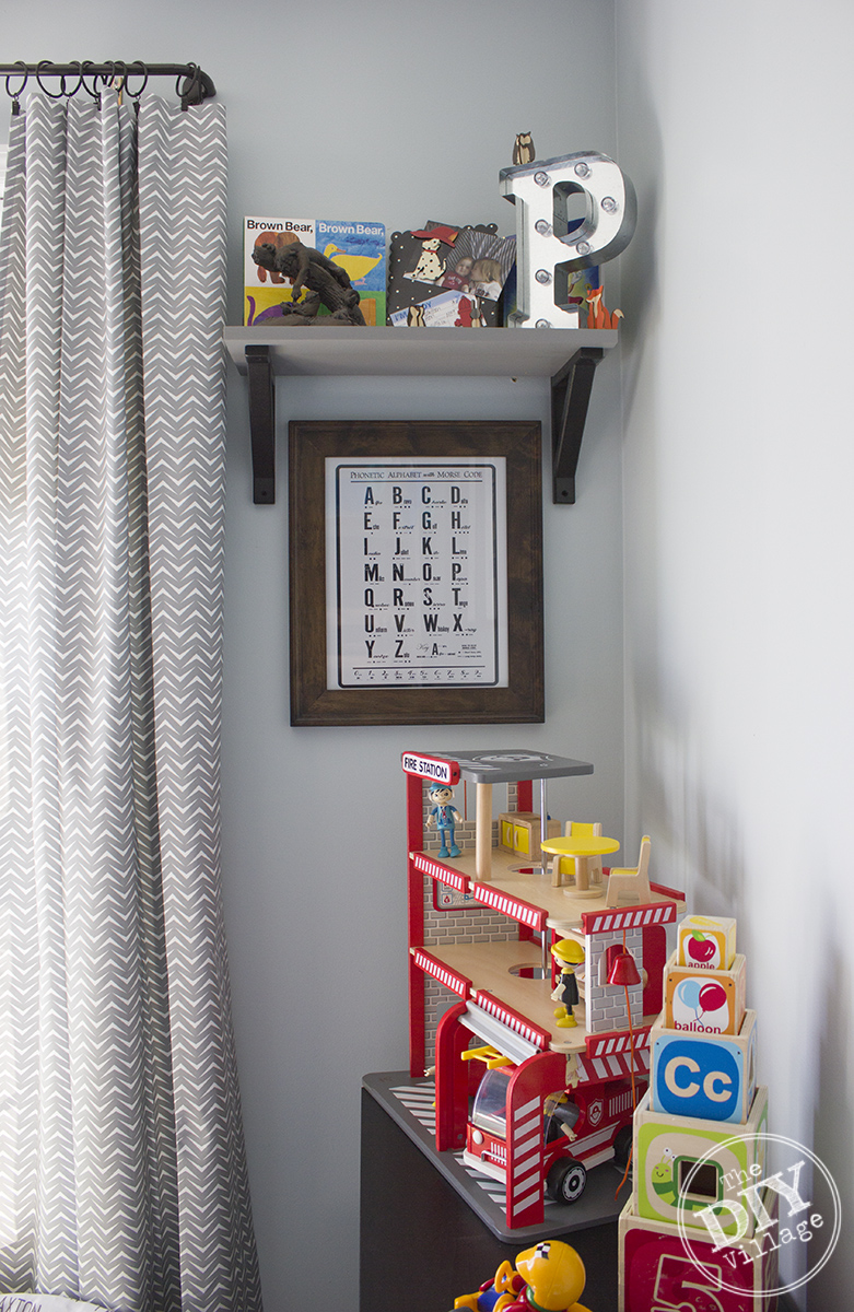 Modern Rustic baby nursery with bright pops of color and custom Alphabet Art.