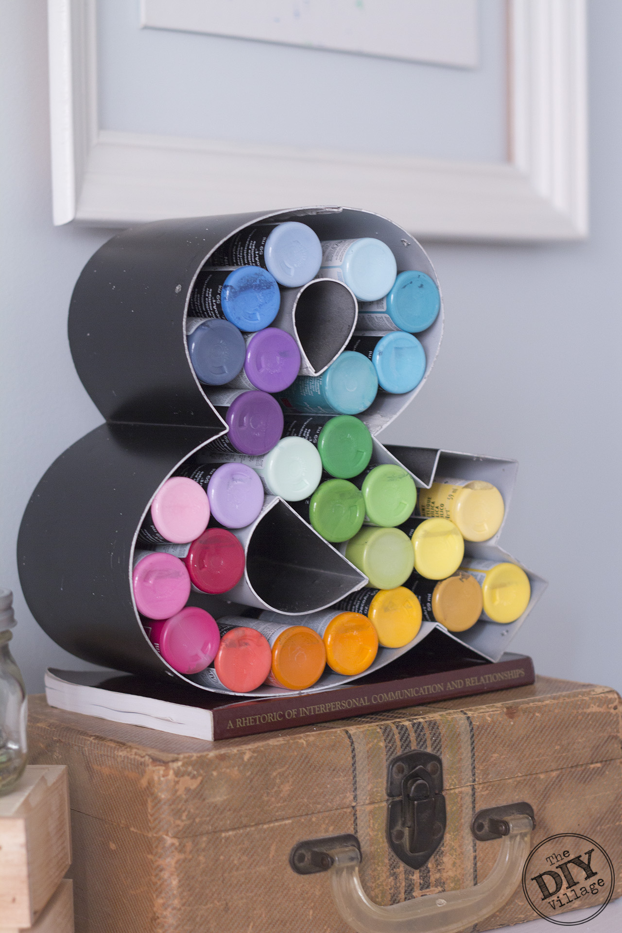 Super creative craft paint storage.