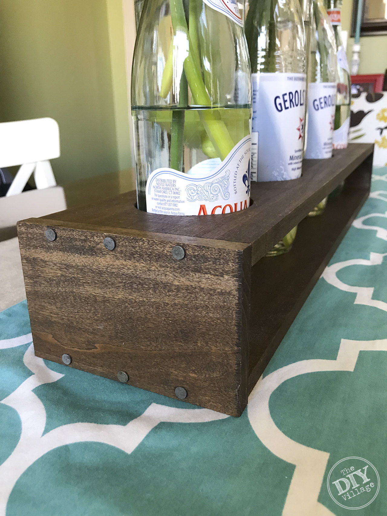 Easy DIY Bottle Vase Holder with nailhead trim