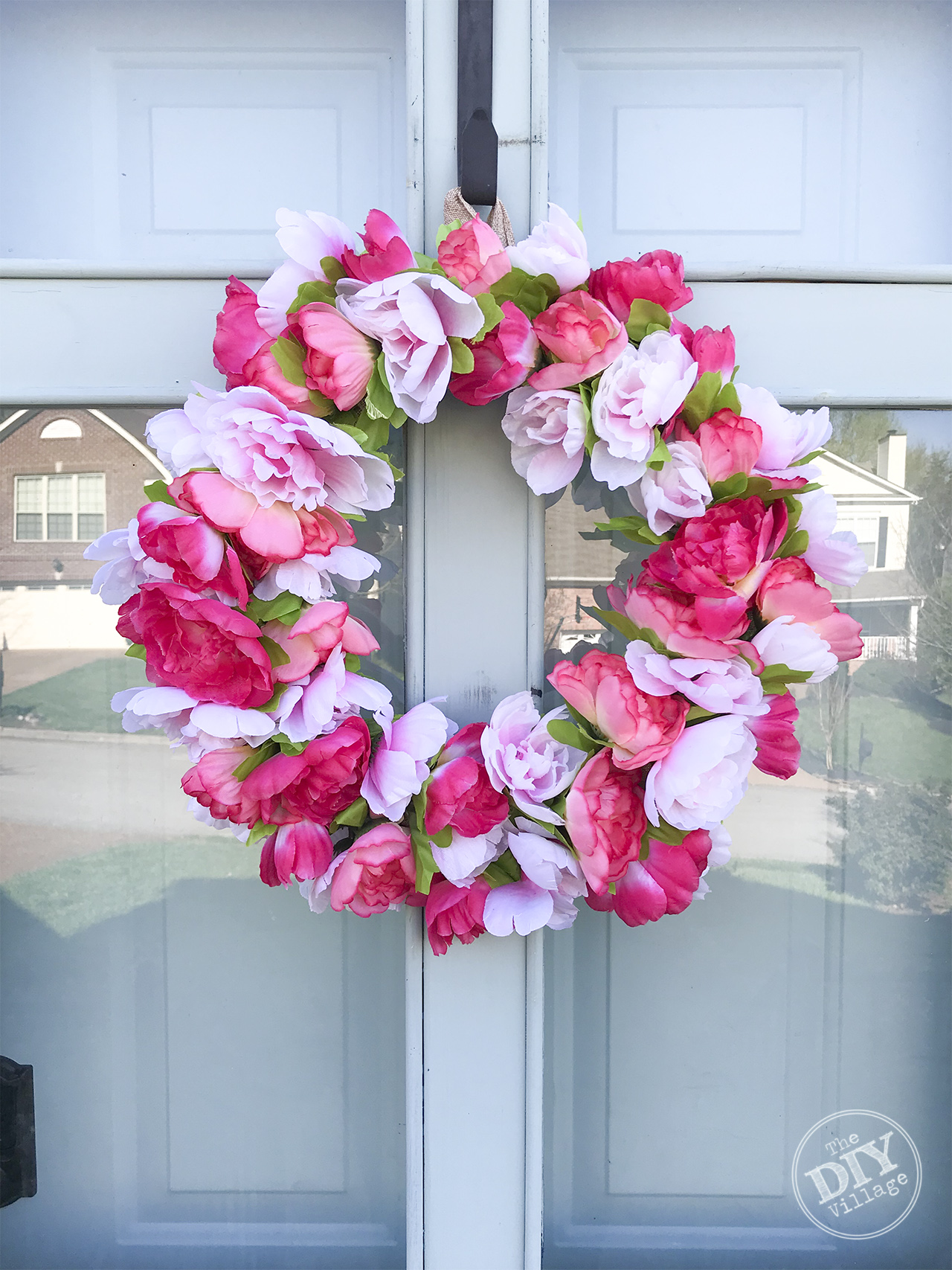 Easy pink peony wreath for under $15 #dollarstore #crafts #wreath #peony #DIY #spring #pink #frontdoors #howto