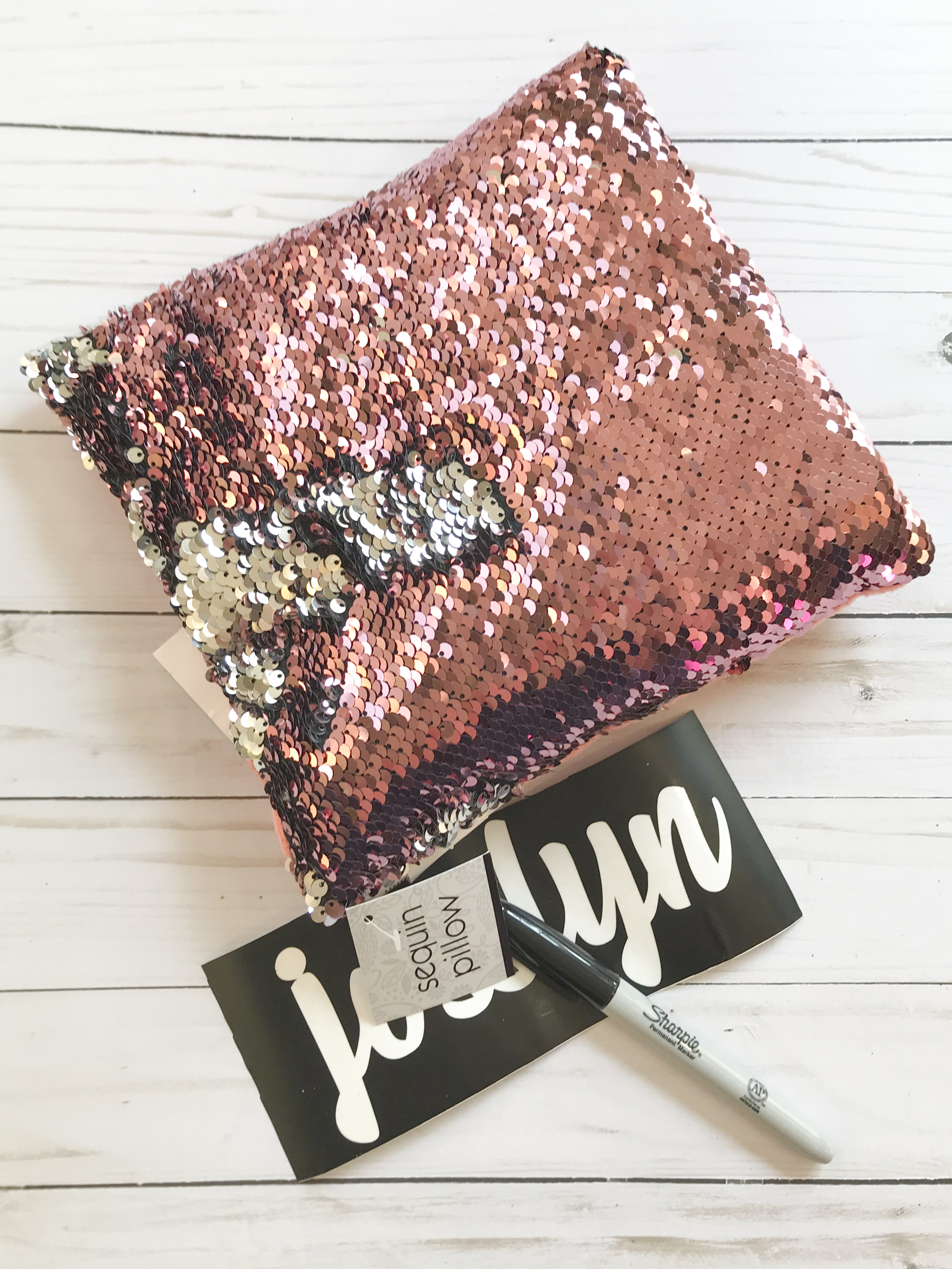 Easy Dollar Store Project - DIY Hidden Message sequin Pillow. They can be personalized with names, messages, anything! Such a fun idea. #hiddenmessagepillow #diycraft #sequinpillow #personalizedgift #monogrmamedgift #bling #sparkle #dollarstorecraft #dollarstorechallenge #fastcraft